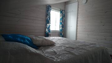 Фото номера Дом с 4 спальнями Дома для отпуска Tarula Holiday Home г. Melkoniemi 44