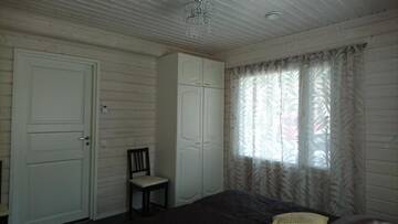 Фото номера Дом с 4 спальнями Дома для отпуска Tarula Holiday Home г. Melkoniemi 56