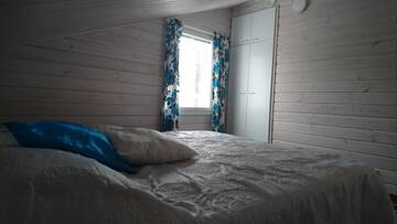 Фото номера Дом с 4 спальнями Дома для отпуска Tarula Holiday Home г. Melkoniemi 53