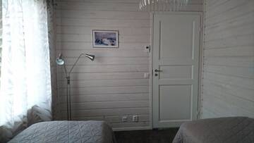 Фото номера Дом с 4 спальнями Дома для отпуска Tarula Holiday Home г. Melkoniemi 54